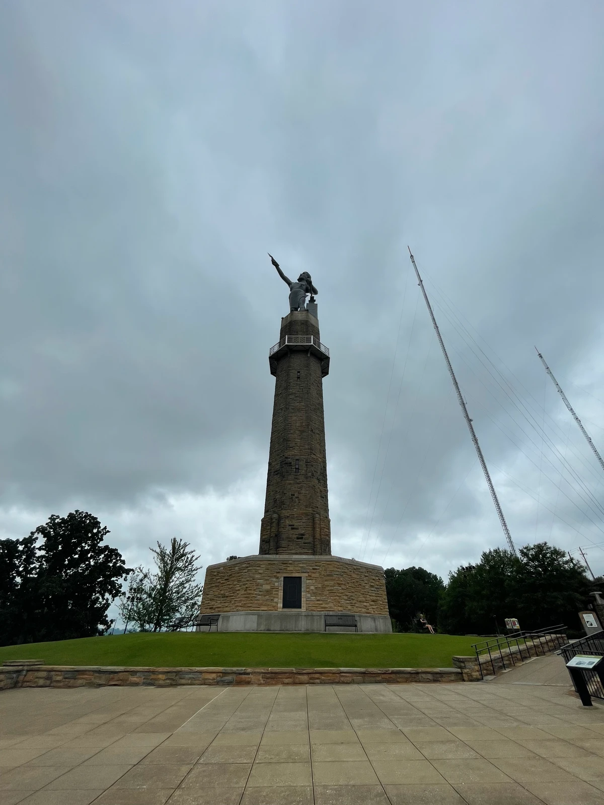 Vulcan standing above Birmingham, Alabama, on his stone pedestal
